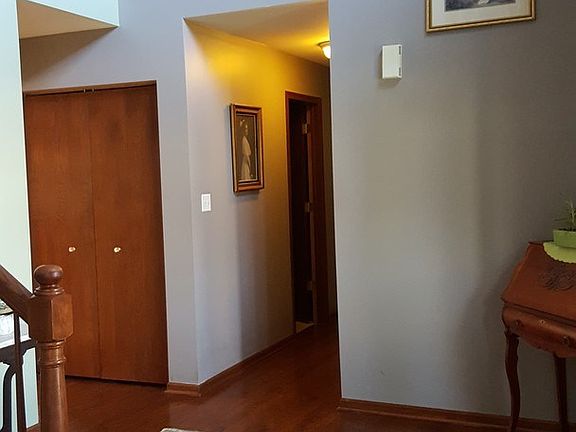 Large Foyer with beautiful hardwood floors