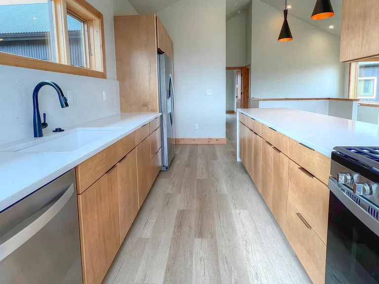 Ample counter space for prep, gas stovetop