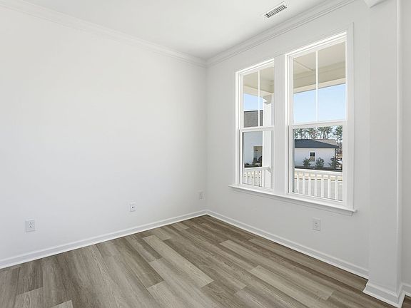 The main level flex room of the Sterling at Wendell Falls.