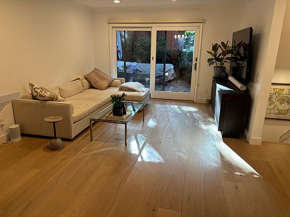 Living room goes out to private deck