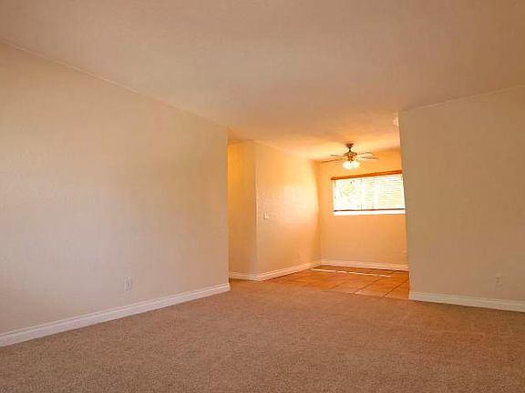 Living Room facing away from front door with view into dining area. Kitchen pics coming once new stainless steel LG appliance suite is installed on 11/18!