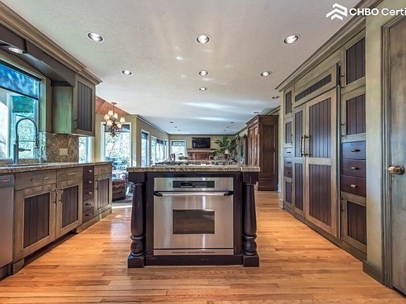 Gourmet kitchen & high-end appliances all with a city view