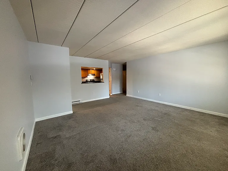 Unit 410 - View from living room to kitchen