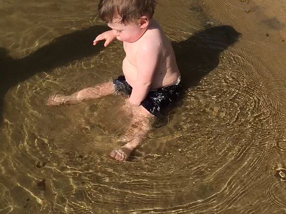 Sandy bottom and clear water