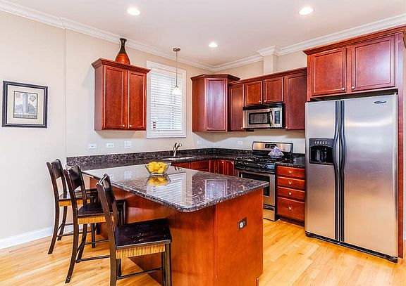 3rd image of 5691 W Higgins Ave Unit 1E