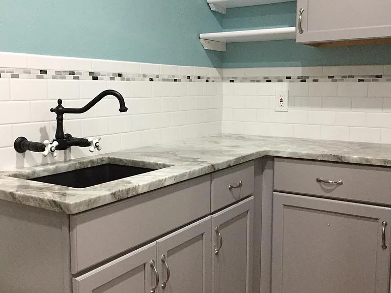 Kitchen quartz sink with granite countertops