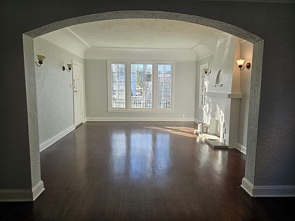 Living room with french window from the dining area.