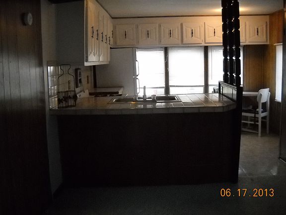 VIEW OF KITCHEN FROM L.R. 