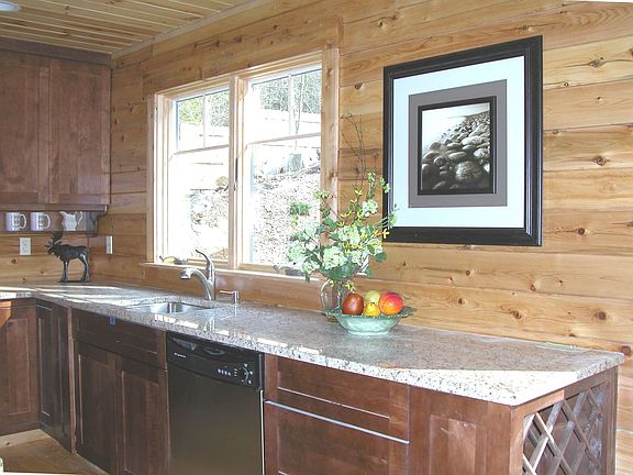 Granite counters grace custom cabinets