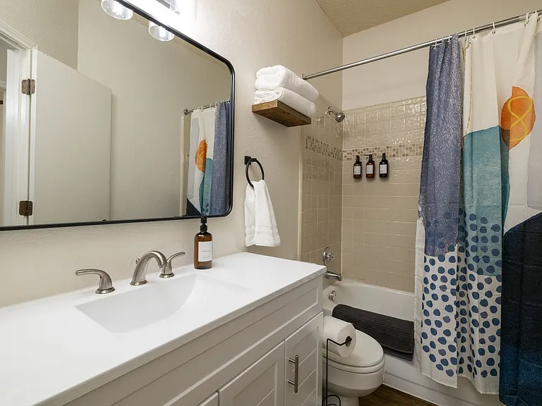 Bathroom #2- Shower/tub combo with plenty of counter space