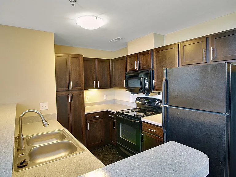Fully stocked kitchens with open view to living space