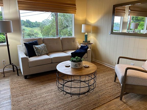 Living room w/TV, mountain views