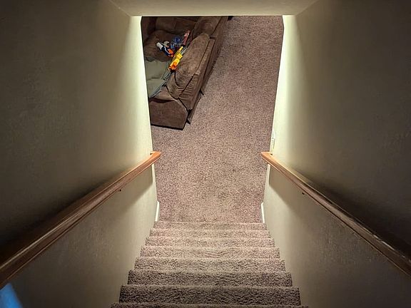 Interior Stairwell to basement (directly off/downstairs from garage entrance through mud room