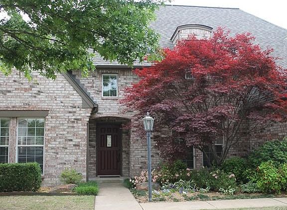 Love the Japanese Maple that adds bright color to the entryway - roof has recently been replaced and the house features gutters front and back for proper water deflection