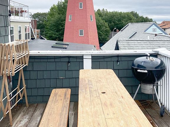 Private deck neighbors Portland observatory.