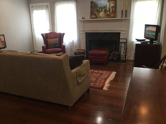 Living room with wood burning fireplace, firewood available on site