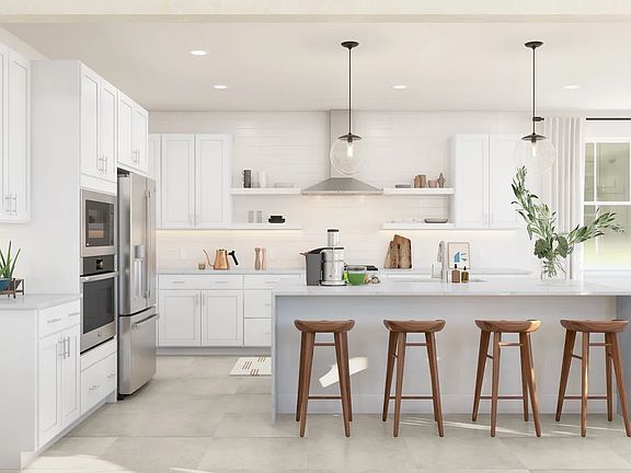 Kitchen with pendant lighting and floating shelves