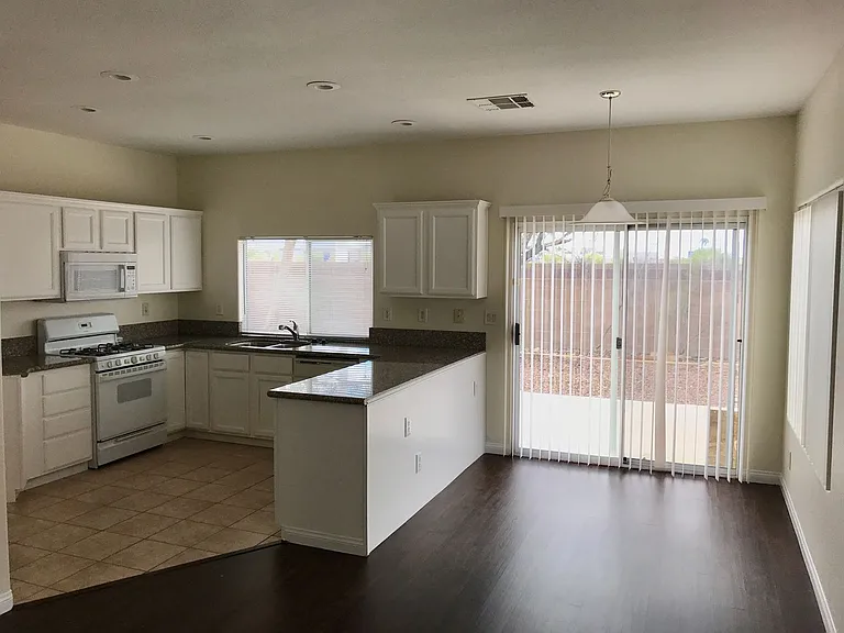 7026 Rustling Winds Ave — Photo 4