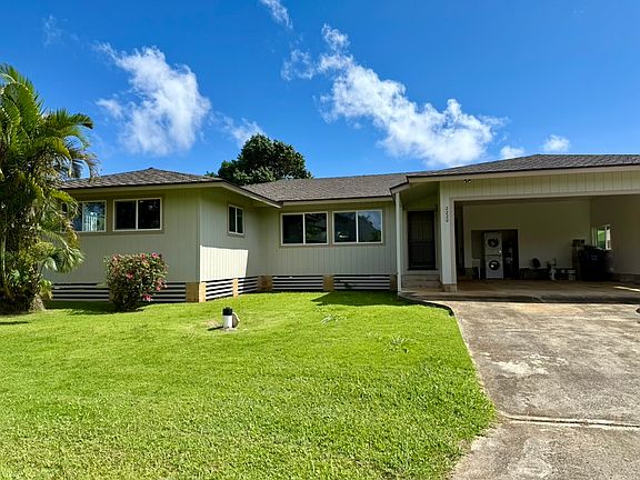 View from the street- spacious carport