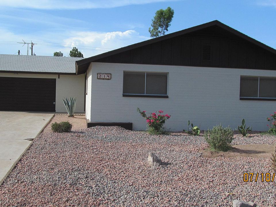 FRONT OF HOUSE WITH TWO CAR GARAGE