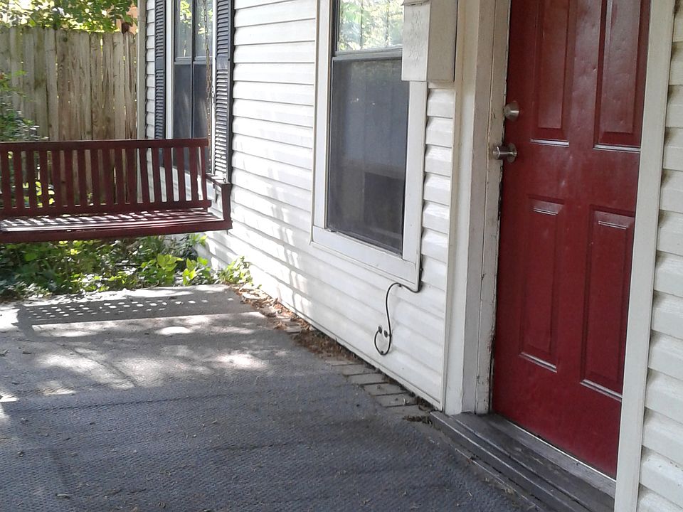 Cozy vintage porch swing.