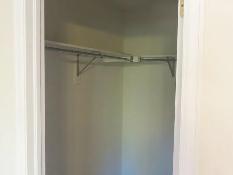Large walk-in closet in master bedroom