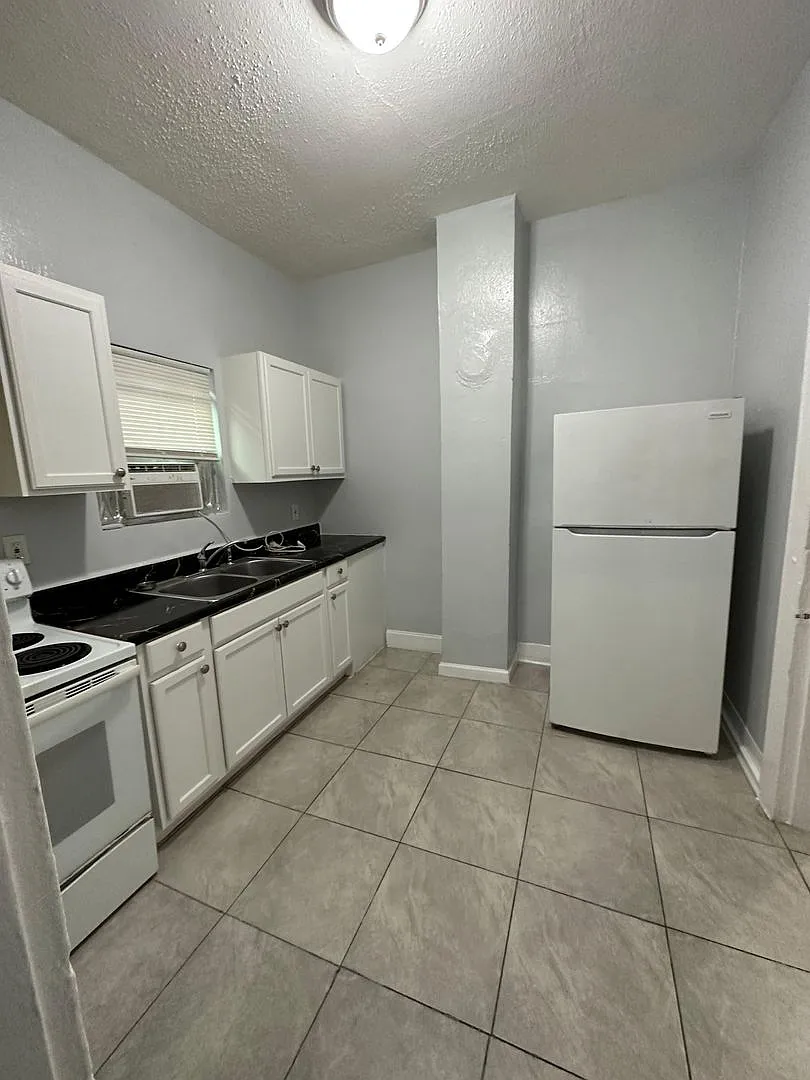 Fully Renovated 1/1 -Single Family Ready to Move In! — Photo 1