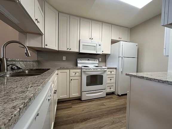 Kitchen- oven, fridge, dishwasher, washer and dryer