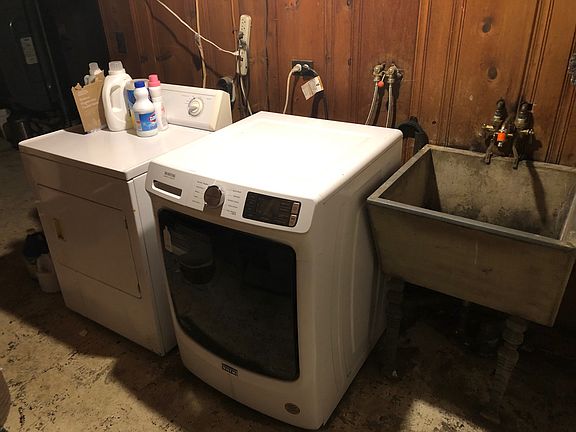 Shared washer/dryer. That sink is the one where you'd wash dishes. I just got the faucets replaced. Works great.