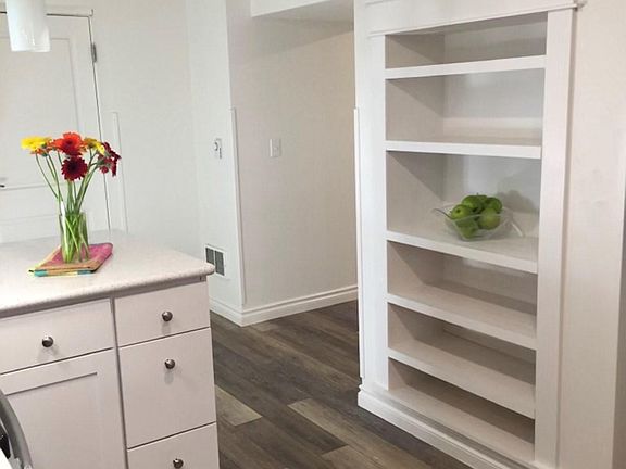 Sweet kitchen built in storage.