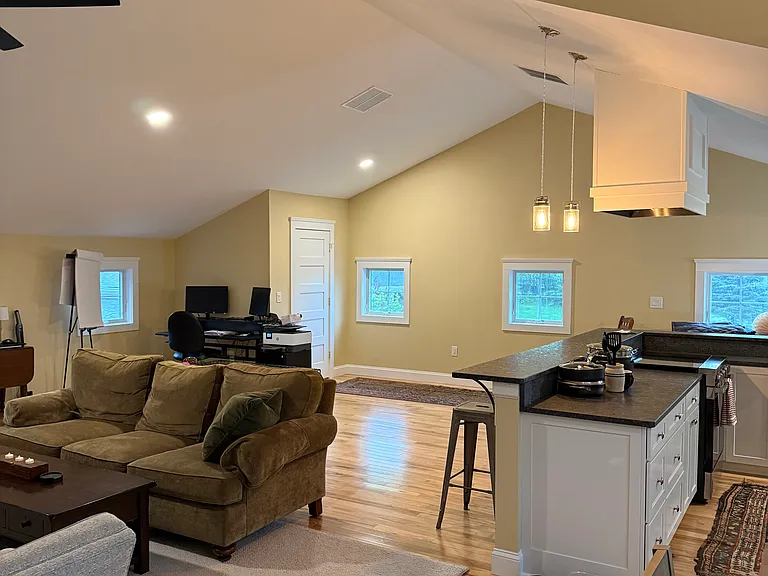 Living room. Bartop. Office space and closet. Hickory floors