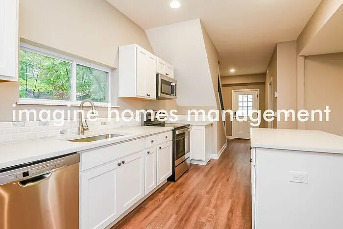 7447 Stearns Rd — Photo 5