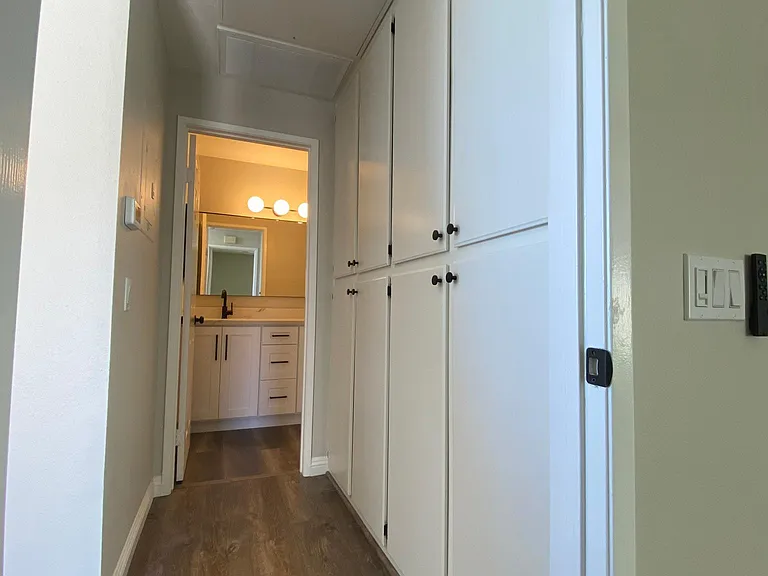 Hallway with extra storage cabinets