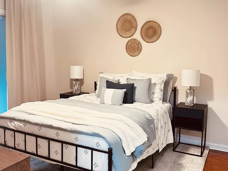 Master bedroom. Brand new queen Nectar mattress. En suite bathroom. Porch access as well.