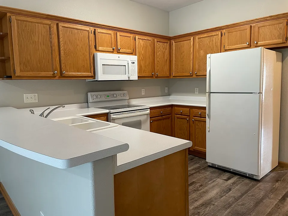 Kitchen area with stove/range, microwave and refrigerator included