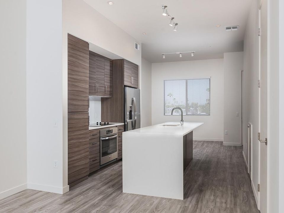 European Inspired kitchen featuring infinite quartz countert