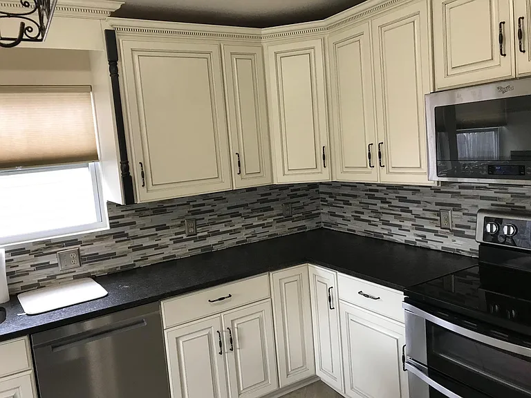 Soft close custom cabinets with drawer and custom pull outs for oven pans and cookie sheets