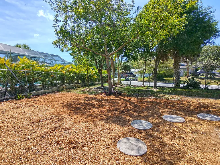 Large Fenced Side Yard with Fruit Trees