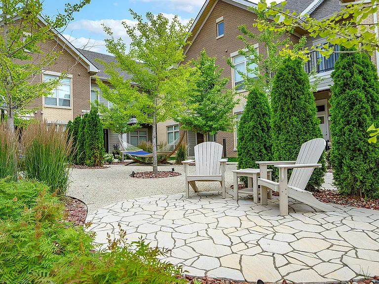 Outdoor Oasis with Hammocks and Adirondacks