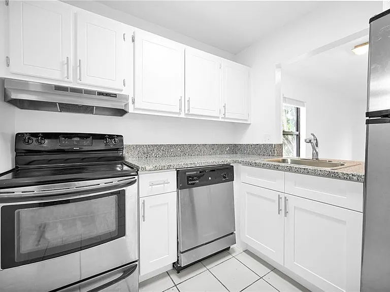 Colonial Village - 7550 Stirling Rd — Photo 5
