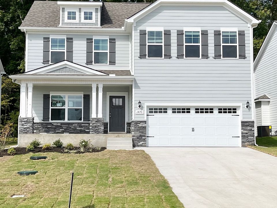 Wonderful new floorplan in pale grey with dark grey accents. Driveway is over 40 ft long. House ha