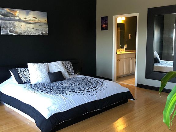 master bedroom with 2 walk in closets and large full bathroom