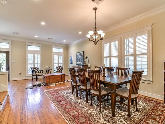 Expansive Dining and Living combination greets you as you enter the home.