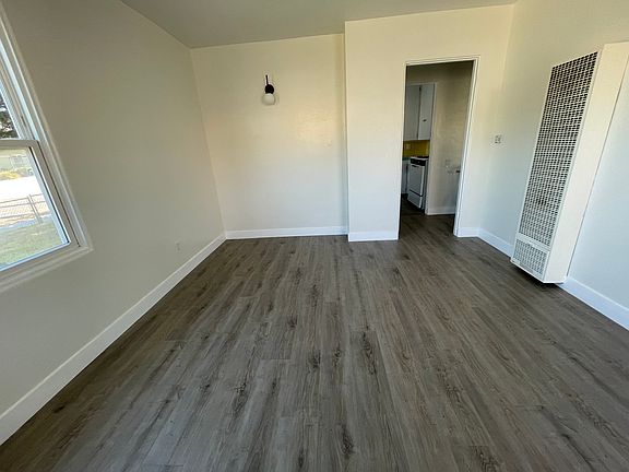 Spacious family room with view to front yard