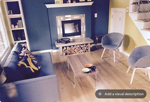 Other view of front room seating area. Furniture included with rental. Wood burning fireplace can heat much of the home.