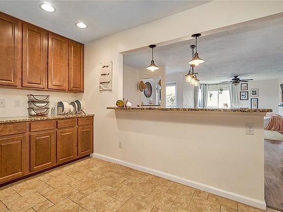 Extra storage and prep space plus kitchen bar counter