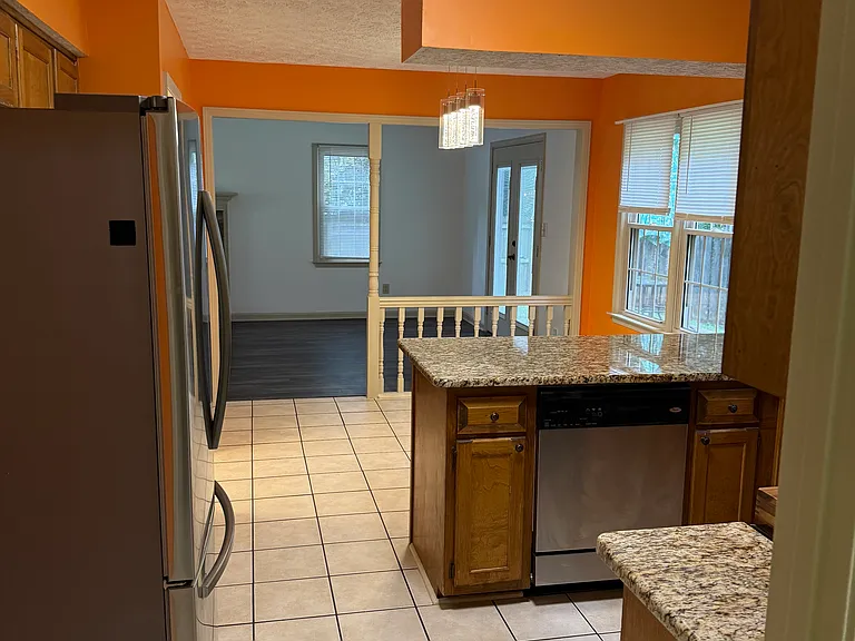 Tiled kitchen and laundry room floors