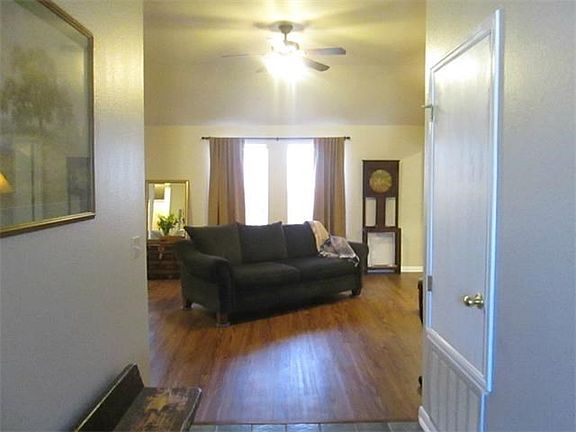 Wide entry way leads to living area.