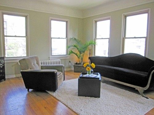 Walls of windows for loads of light. Hardwood floors, coved ceilings, archways and original art-deco hardware!