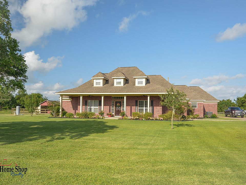 Welcome Home!  Over 6 Acres!